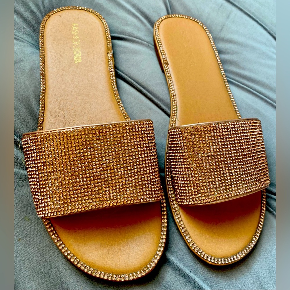 Fashion Nova slides in gold. Size 7.5 in women. Worn once.